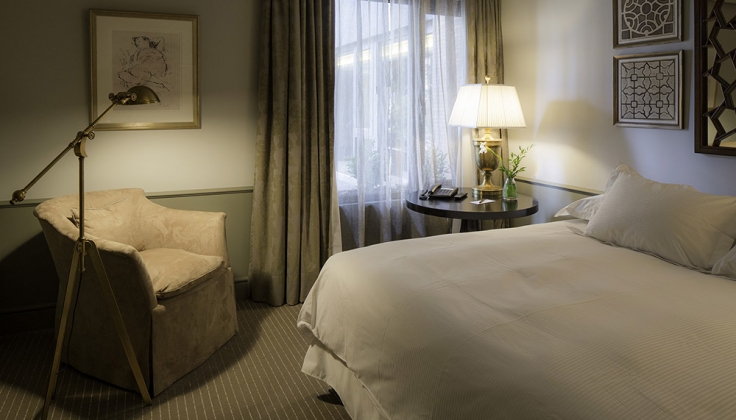 The Singular Hotel Bedroom