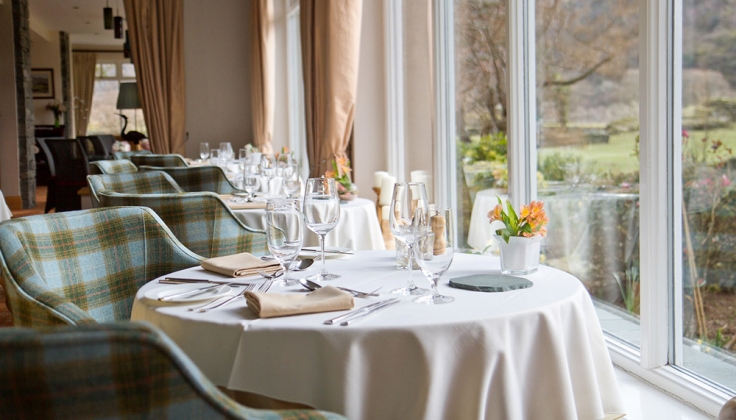 dining table set beside window