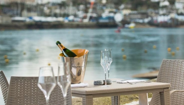 Old Quay House dining area overlooking marina