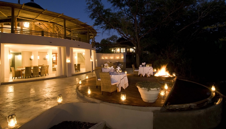 sanctuary sussi chuma exterior lodge at night
