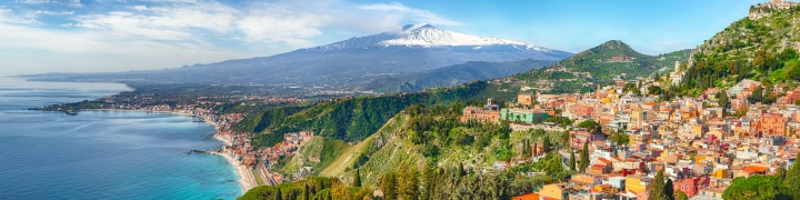Scenic view of Mt. Etna in the distance in Sicily, Italy